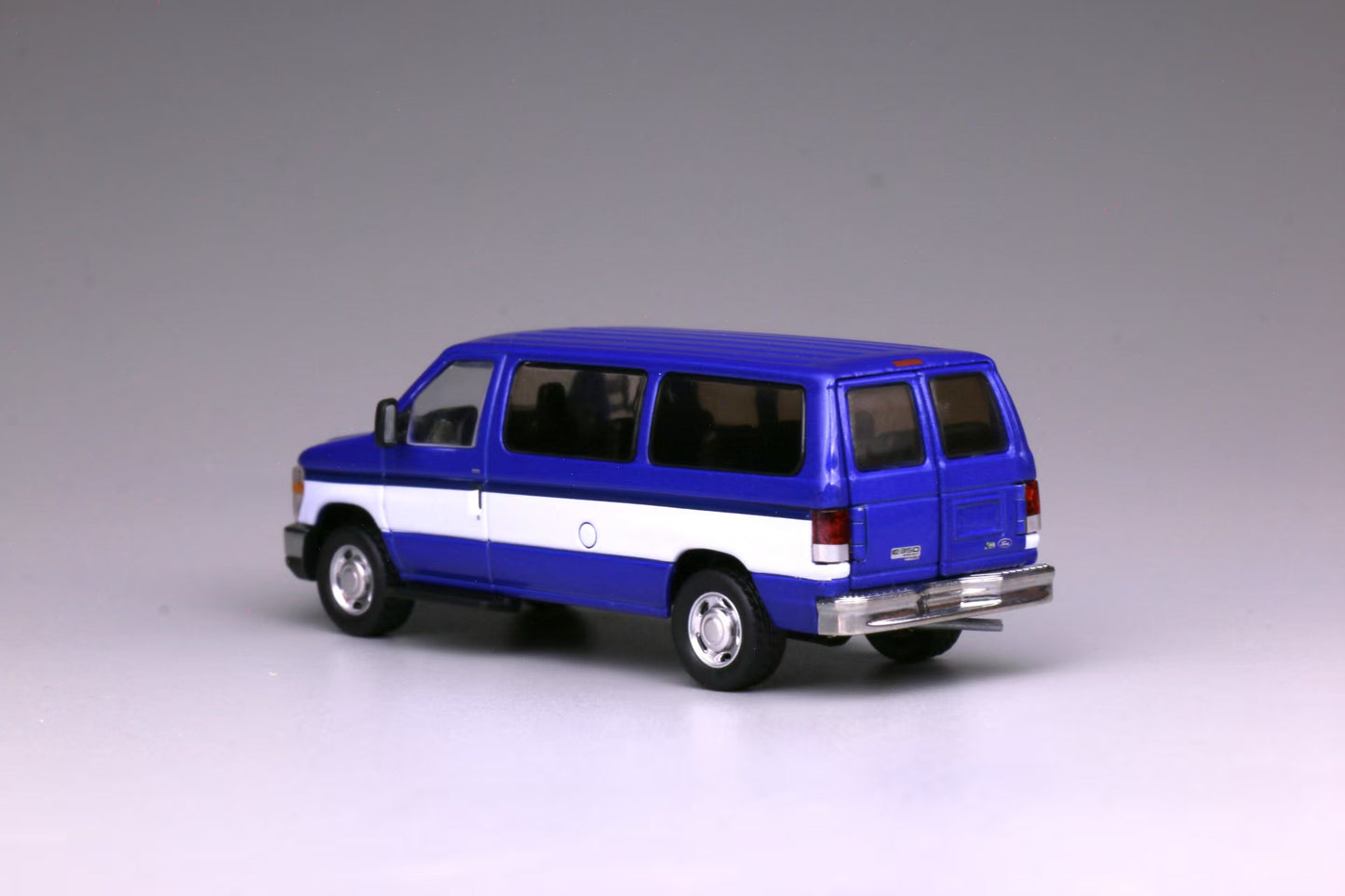 596 1:64 Ford E350 Blue with Openable Rear Door and Acrylic Case