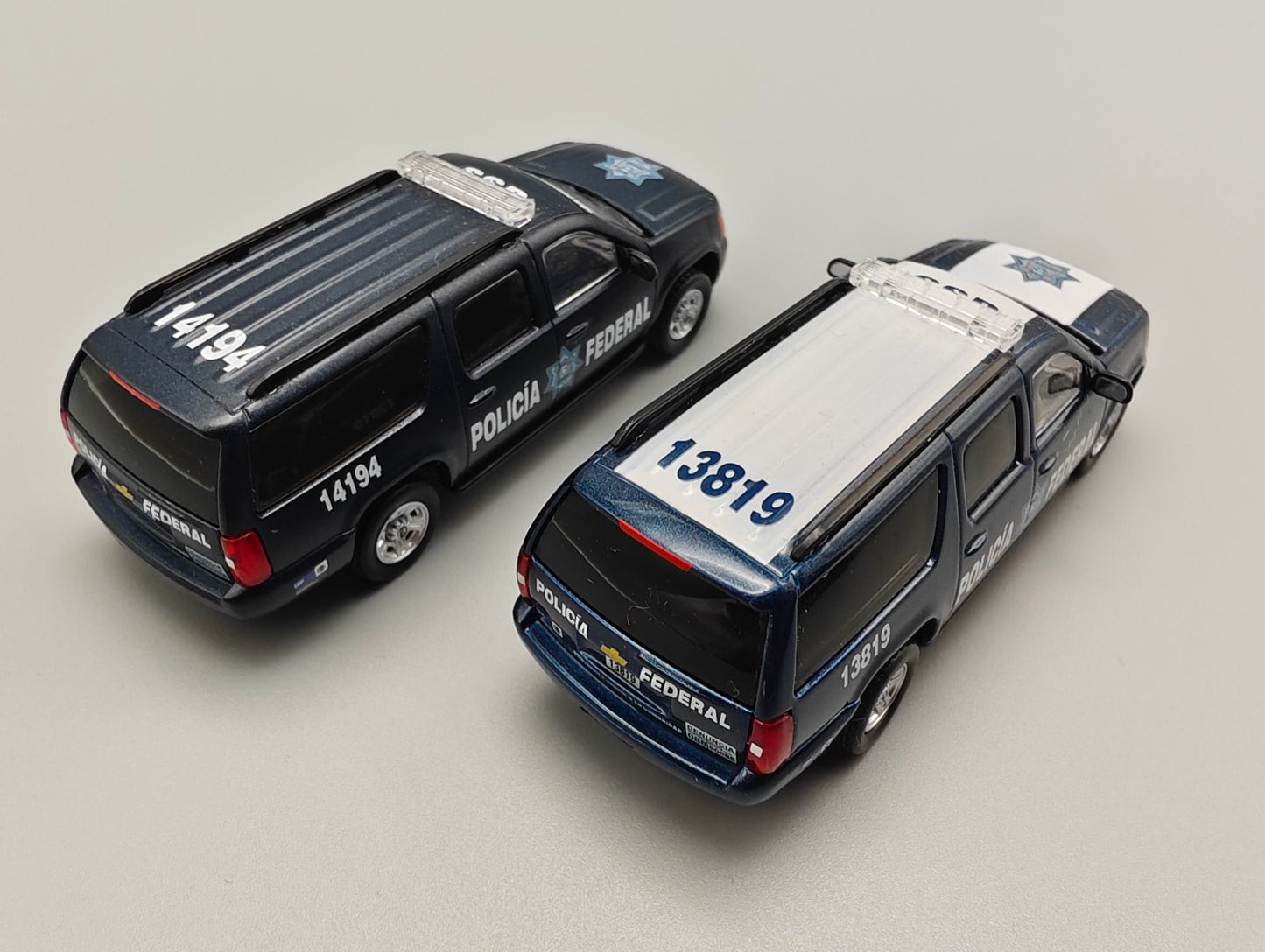 596 1:64 Mexico Exclusive Chevrolet Suburban Mexico Federal Police 2 version